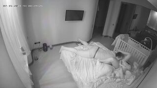 Married couple having sex in front of a baby