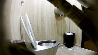 Restaurant toilet voyeur