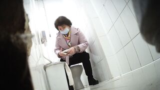 Spy toilet masturbation