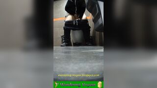 Girls peeing urinals