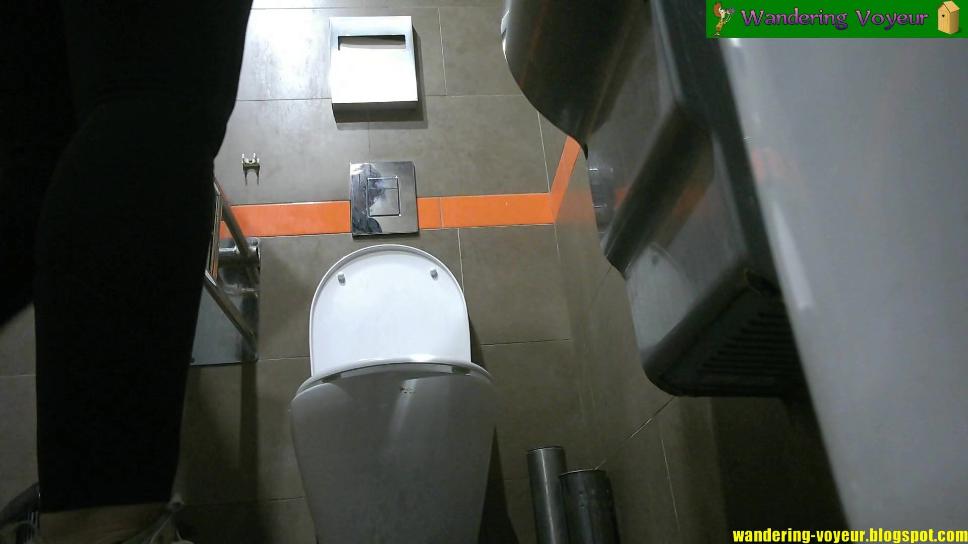 Set up spy camera in toilet