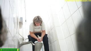 Woman toilet voyeur