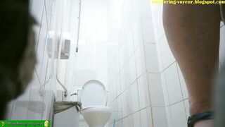 Girl in toilet hidden spy cam