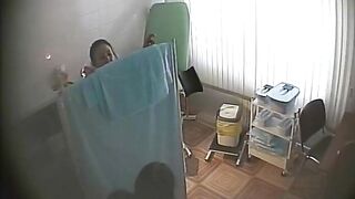 Real hidden camera in gynecological cabinet 12
