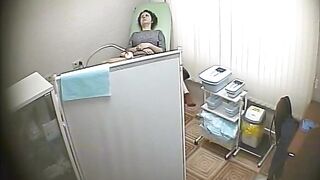 Real hidden camera in gynecological cabinet 12
