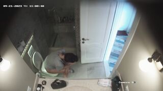 Teenage girls naked peeing on a box