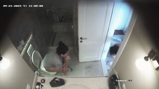 Teenage girls naked peeing on a box