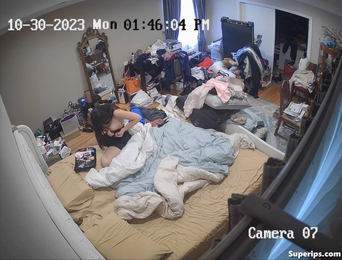 Teen American changes her clothes in her parents’ room