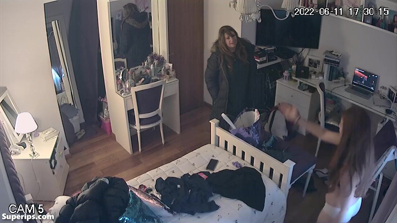 Redhead girl walks around her room showing her panties