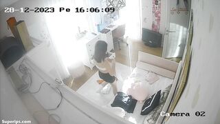 Gorgeous French girl gets dressed in her room