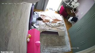 Petite teen girl sleeps naked in her bed