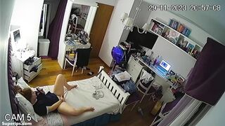 Naughty redhead girl fingers her pussy
