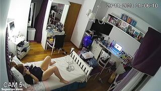 Naughty redhead girl fingers her pussy