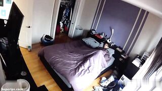 Single American woman masturbates in her bed