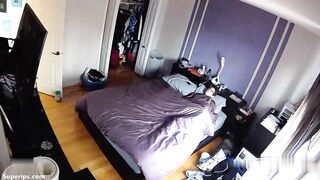 Single American woman masturbates in her bed