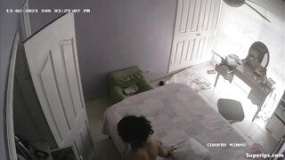 Latina girl rubs her pussy while watching porn