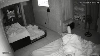 Young lovers having sex before going to sleep recording