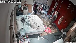 German blonde girl gets dressed in her room