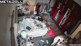 German blonde girl gets dressed in her room