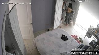 Latina teen girl is naked in her room