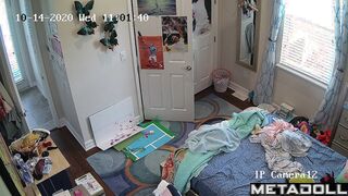 Teenage tennis girl gets dressed in her room