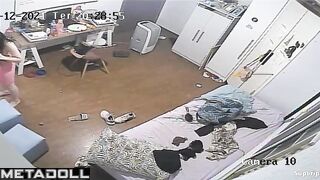 Teenage girl gets dressed slowly in her room
