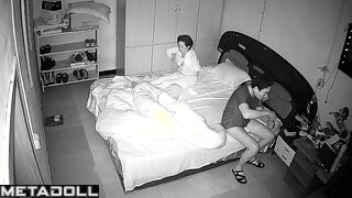 Asian married couple fucks in their bed