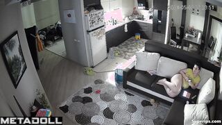 Naked mature mom watches porn on the couch