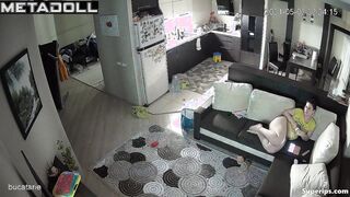 Naked mature mom watches porn on the couch