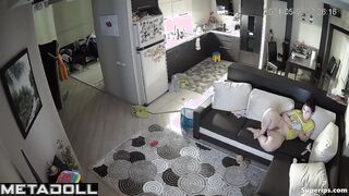 Naked mature mom watches porn on the couch