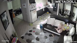 Naked mature mom watches porn on the couch
