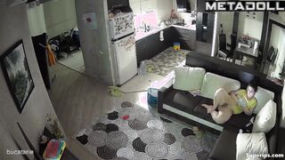 Naked mature mom watches porn on the couch