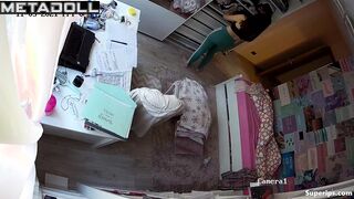 Gorgeous college girl gets dressed in her room