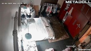 Gorgeous blonde girl gets dressed in her room