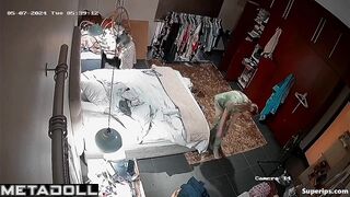 Gorgeous blonde girl gets dressed in her room