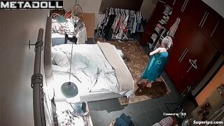 Gorgeous blonde girl gets dressed in her room