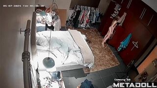 Gorgeous blonde girl gets dressed in her room