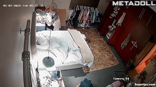 Gorgeous blonde girl gets dressed in her room