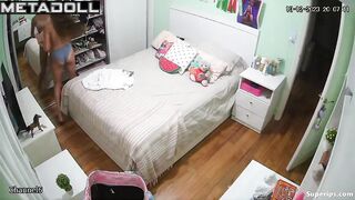 Tanned British girl is naked in her room