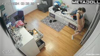 Gorgeous American girl changes clothes in her room