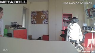 Blonde girl with glasses gets dressed in her room