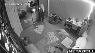 Brunette girl gets dressed in her room