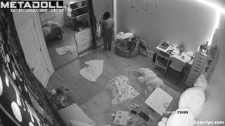 Brunette girl gets dressed in her room