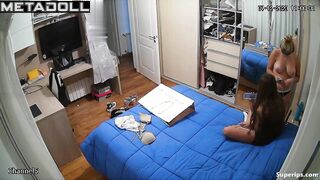 Blonde girl gets dressed in front of her sister
