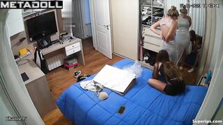 Blonde girl gets dressed in front of her sister