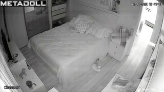 Petite British girl gets dressed in her room
