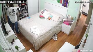 Petite British girl gets dressed in her room