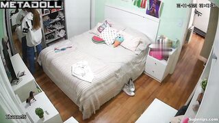 Petite British girl gets dressed in her room