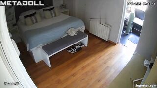 Mature blonde woman is naked in her room