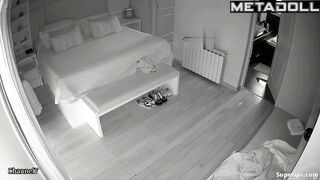 Mature blonde woman is naked in her room